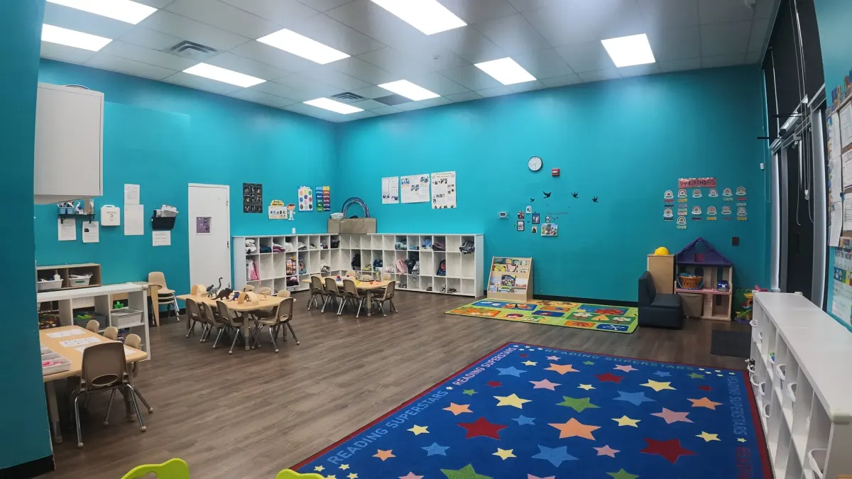 A bright school-age care room at Curious Minds Daycare and OSC